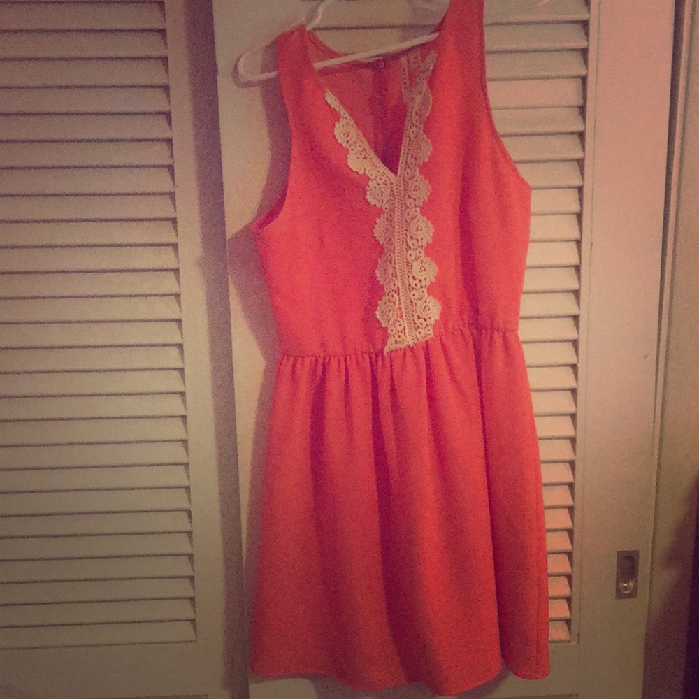 Coral dress with lace details